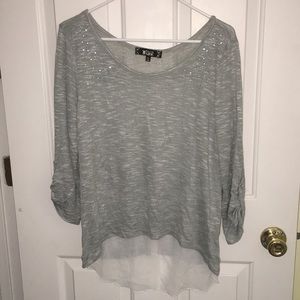 grey sweater with beading and sheer insert
